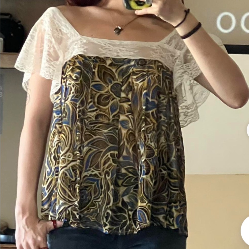 Beautiful Flowy top with lace details and buttons down back